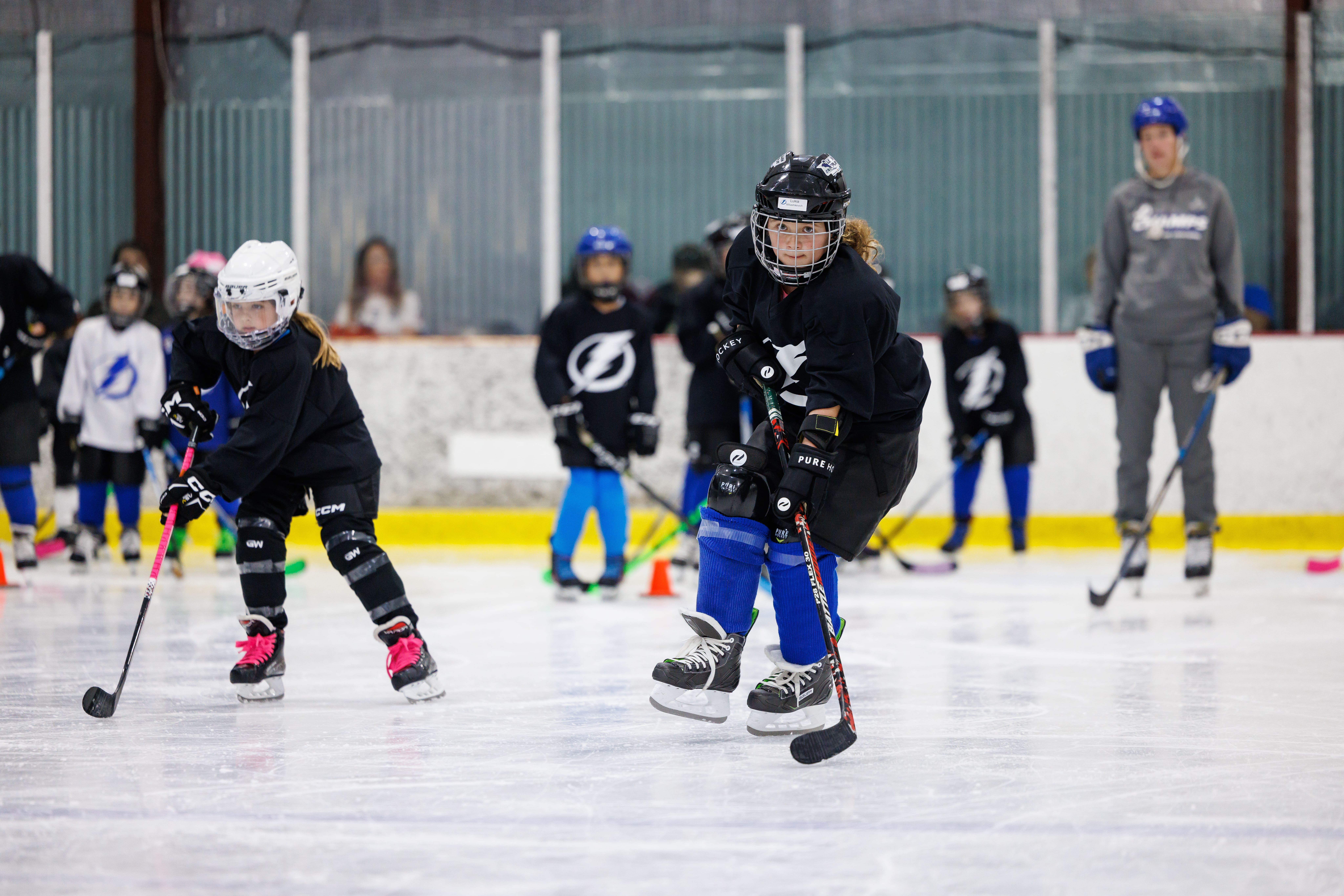 TAMPA, FL - JANUARY 29: Kids ages 5-10 participate in the Tampa Bay Lightning rookie league hockey program at Xtra Ice Power Pole on Sunday, January 29, 2023 in Tampa, Florida. Rookie League is a next steps program for young players who are preparing to participate in a local hockey league and is coached by Lightning Alumni and Staff. The Tampa Bay Lightning are committed to providing girls within Florida and the Tampa Bay Area a safe, competitive environment to grow their individual hockey skills while promoting the enjoyment, appreciation and understanding of hockey. 
(Photo by Casey Brooke Lawson/Tampa Bay Lightning)